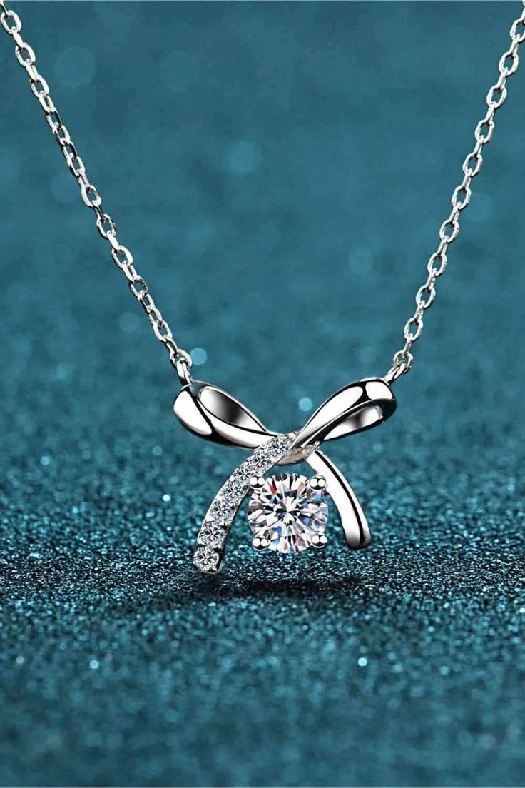 Tilda’s Bow Diamond Drop Pendant